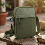 COUNSELOR Textured Sling Bag